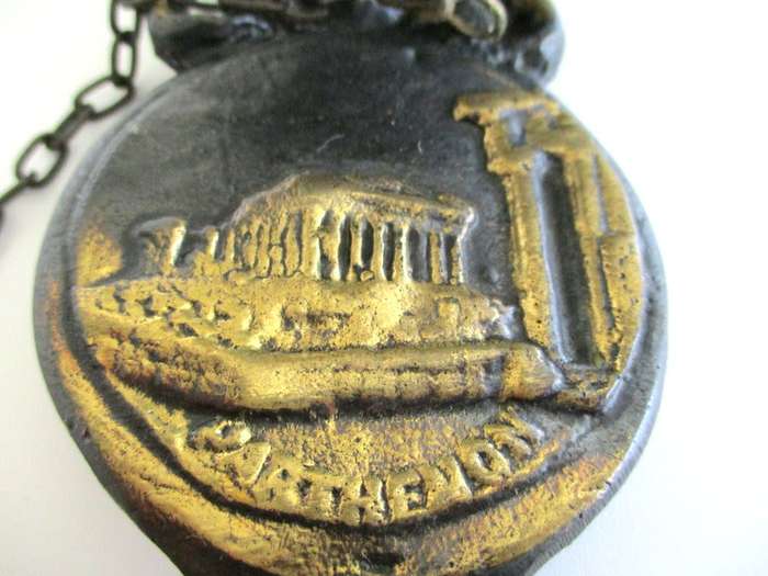 A VINTAGE METAL BELL