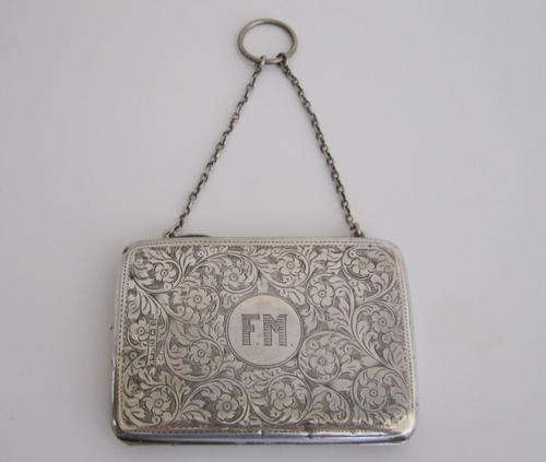 A LADIES HALLMARKED SILVER PURSE/CALLING CARD CASE ---Note
