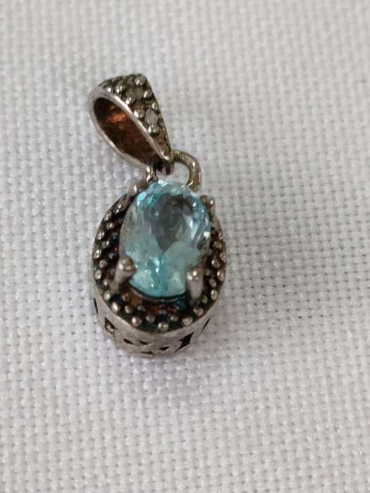Blue Topaz and diamond sterling silver pendant - 925 stamped