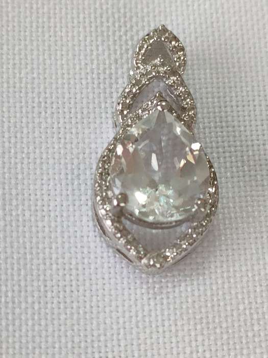 Topaz and diamond sterling silver pendant - 925 stamped