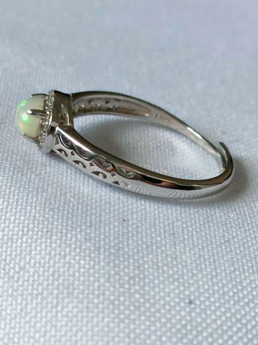 Ethiopian Opal and Topaz sterling silver ring - adjustable size - 0.90ct plus - 925 stamped