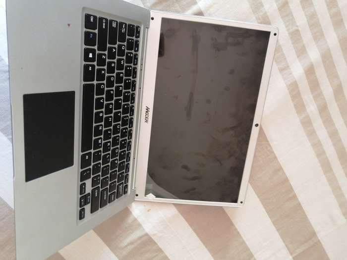 Mecer laptop. Password locked can be used for spares