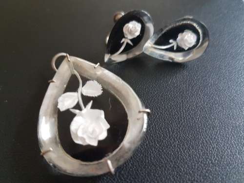 A Stunning Set of Vintage Reverse Carved Lucite Rose Motif Earrings and Pendant Lucite
