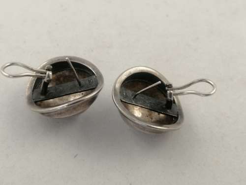 A Striking Pair of Hammered Silver Earrings