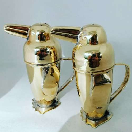An Outstanding Gilt Novelty Art Deco Penguin Salt and Pepper Set