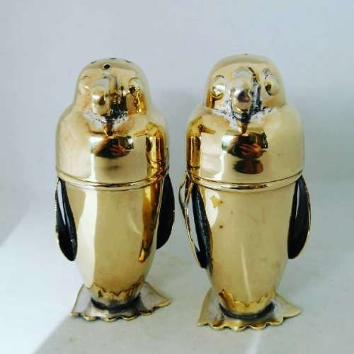 An Outstanding Gilt Novelty Art Deco Penguin Salt and Pepper Set