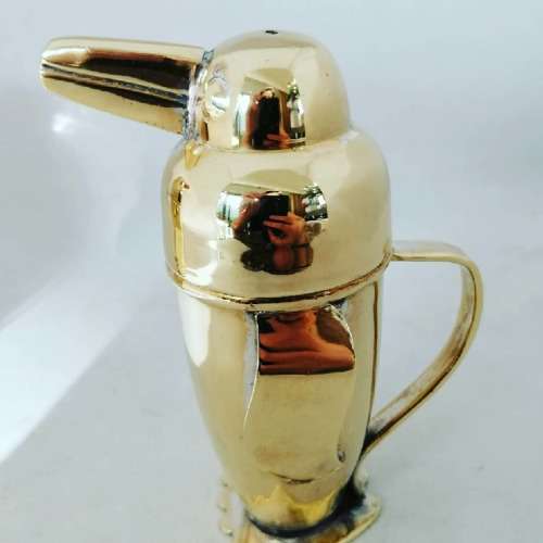 An Outstanding Gilt Novelty Art Deco Penguin Salt and Pepper Set
