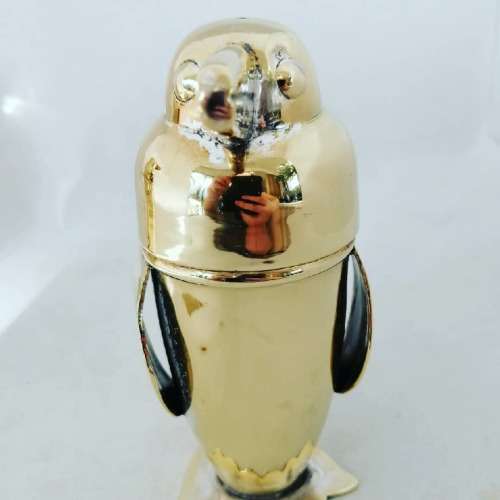 An Outstanding Gilt Novelty Art Deco Penguin Salt and Pepper Set