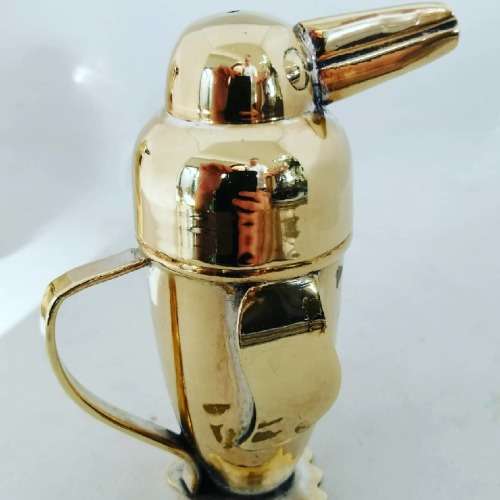 An Outstanding Gilt Novelty Art Deco Penguin Salt and Pepper Set