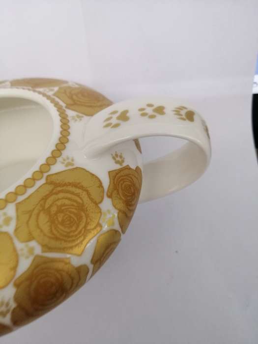 A Beautiful Jenna Clifford cream and gold milk jug.