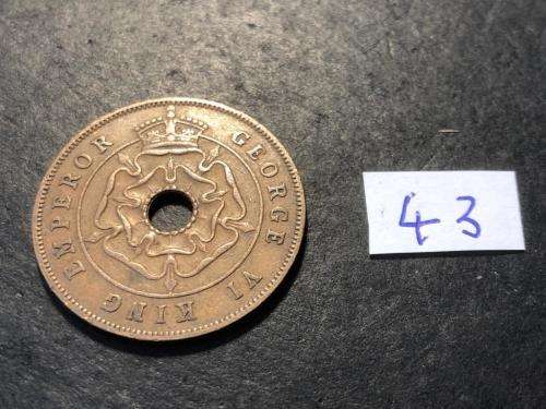 1943 Holed Rhodesian 1 penny coin - King George VI