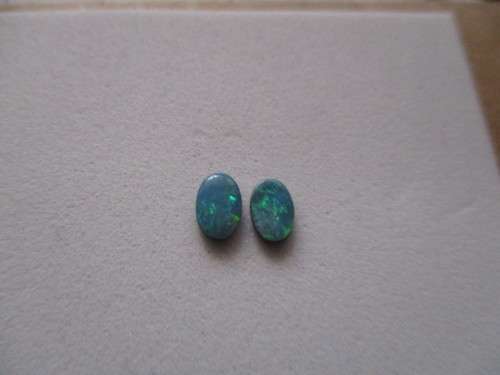 1 lot , 2 Pieces of 6.00 x 4.00 mm Doublet Opals , T. W. 0.67 ct.