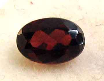 7.00 x 5.00 mm Oval faceted  cut  Garnet   0.98 cts.