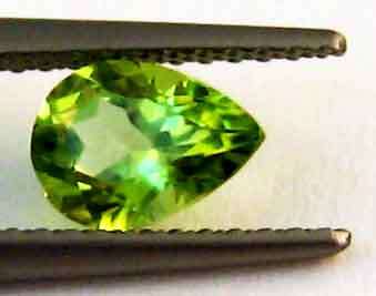 7.00 x 5.00 mm  Pear- faceted  cut  Peridot  0.74cts.
