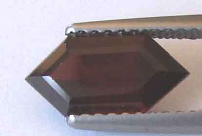 10.70 x 5.30 mm Fancy cut Garnet 1.69 cts.