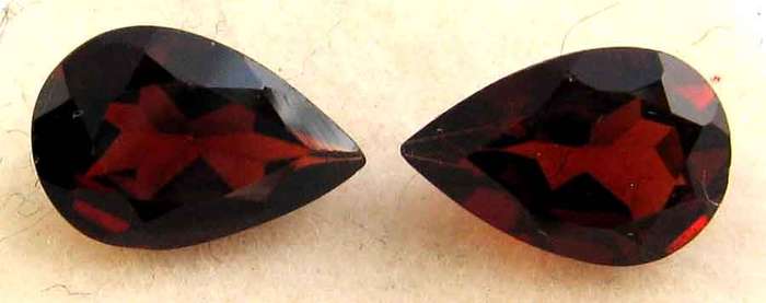 2 pieces of 7.00 x 5.00 mm Pear cut Garnets T.W. 1.80 ct.