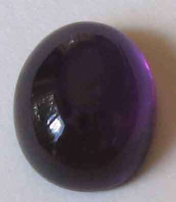 11.00 x 9.00 mm oval cabochon cut amethyst  3.93 ct.s