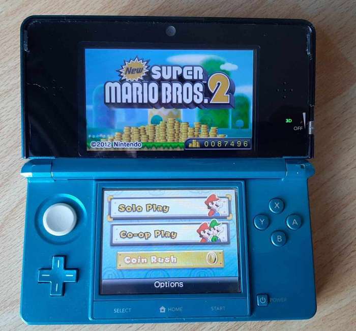 Nintendo 3ds console with original charger