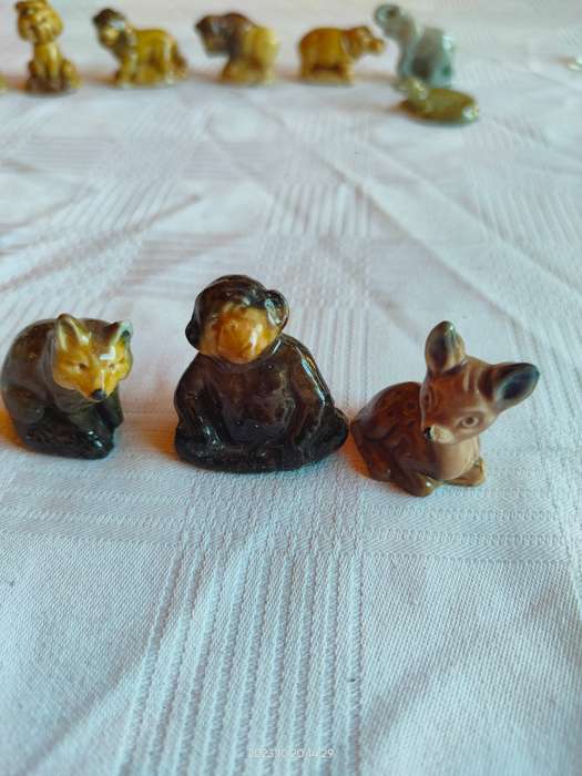 Nice large lot of vintage Wade Whimsies ornaments.