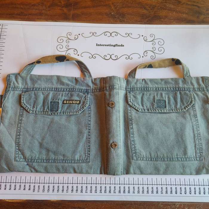 Handcrafted denim phone and charger pouch - not a handbag.