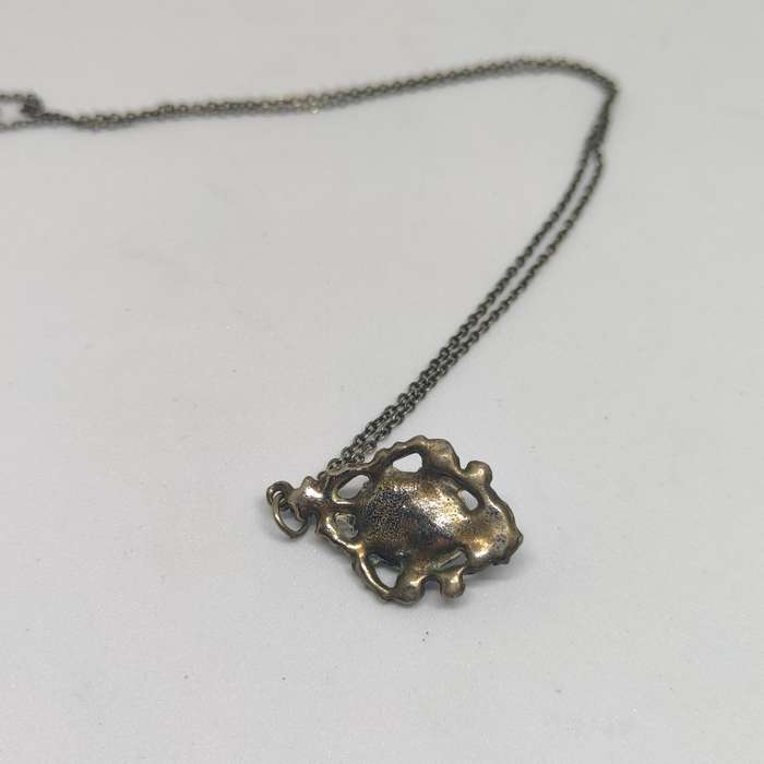Silvertone metal necklace and pendant