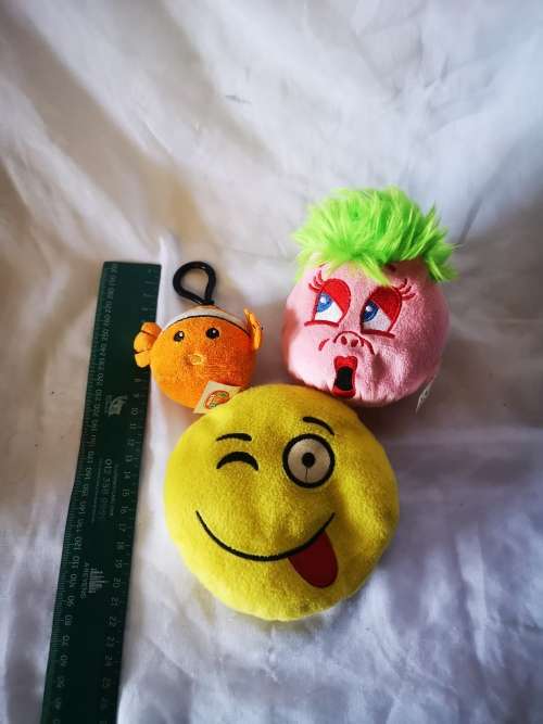 Three cute little plush toys - a pillow, a beanie toy and a key holder.