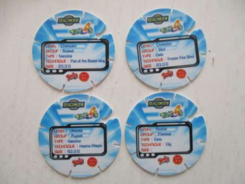 DIGIMON LOT OF 4 TAZOS