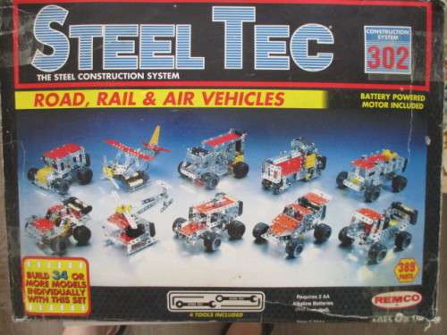 LOVELY STEEL TEC / MECCANO SET IN BOX - MAKE VARIOUS ROAD, AIR RAIL VEHICLES MOTOR MISSING
