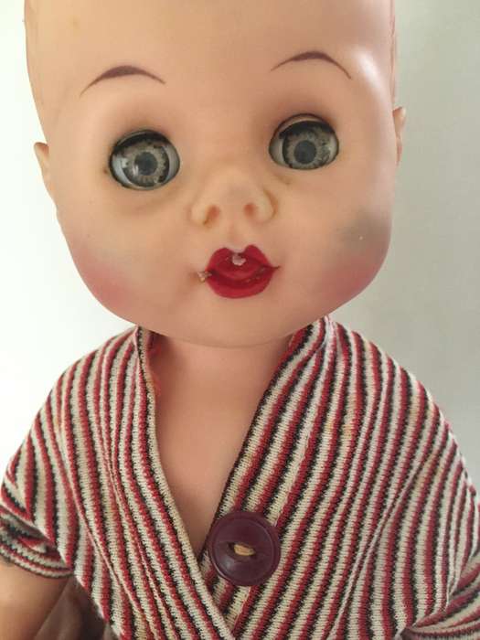 VINTAGE BABY RUBBER TYPE DOLL WITH ORIGINAL CLOTHES MOVING EYES AND LETTER  J ON NECK