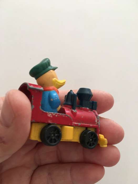 VINTAGE TOMY DIE CAST TRAIN WITH DUCK 1970`S AND PVC FIGURE