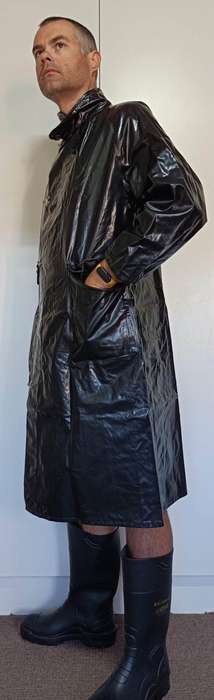 Vintage 1975 shiny black raincoat with metal clasp closure