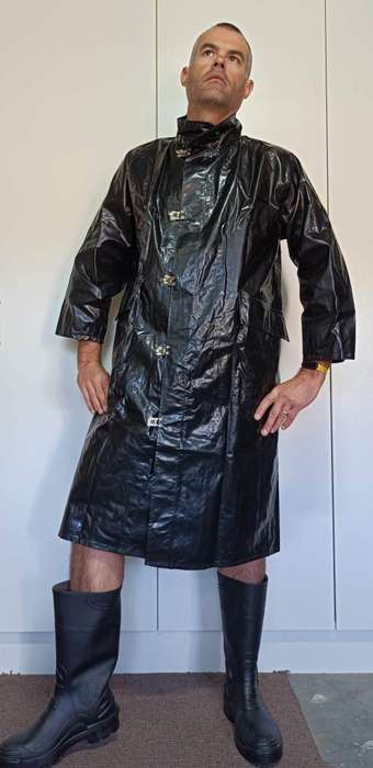 Vintage 1975 shiny black raincoat with metal clasp closure