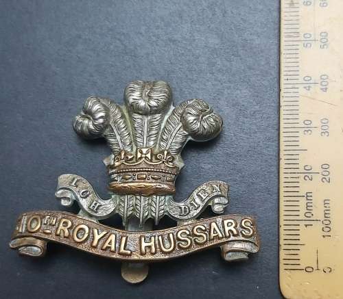 **WW1 - 10th Royal Hussars Bi-Metal Cap Badge w/ Slide.**