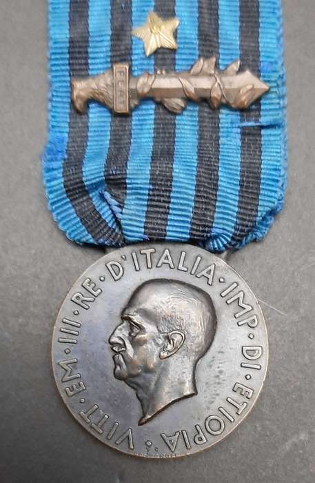 **RARE: 1936 Italian Africa Orientale Fascist Medal w/ Ribbon Devices (Combat & Valour)**