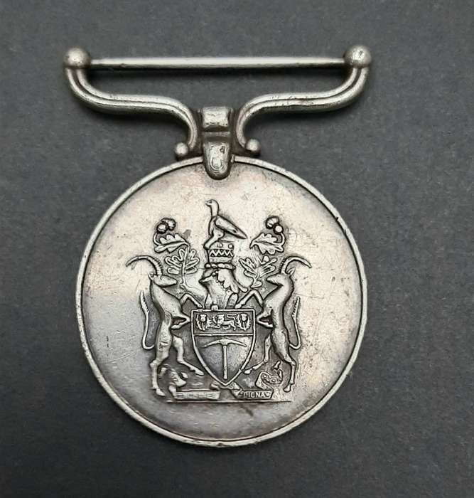 **RARE: 1960s Rhodesian Police Reserve Faithful Service Medal (att. Native).**
