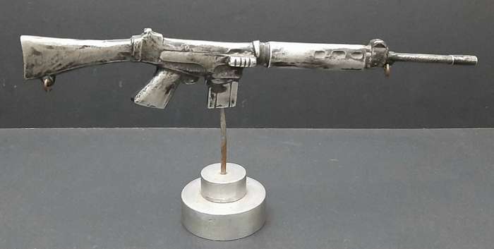 **Rhodesian Bush War: FN FAL Rifle Cast Desk  Model on Plinth (29cm x 12cm).**