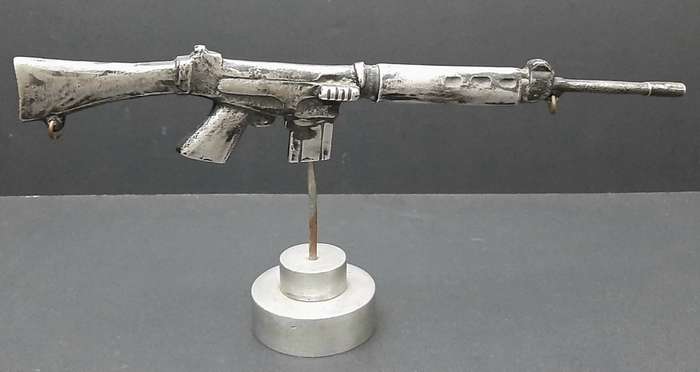 **Rhodesian Bush War: FN FAL Rifle Cast Desk  Model on Plinth (29cm x 12cm).**