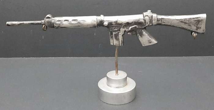 **Rhodesian Bush War: FN FAL Rifle Cast Desk  Model on Plinth (29cm x 12cm).**