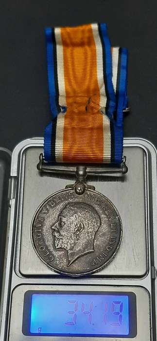 **WW1 UDF: .925 Silver British War Medal w/ Silk Ribbon (4th Dist. Mtd. Rifles).**