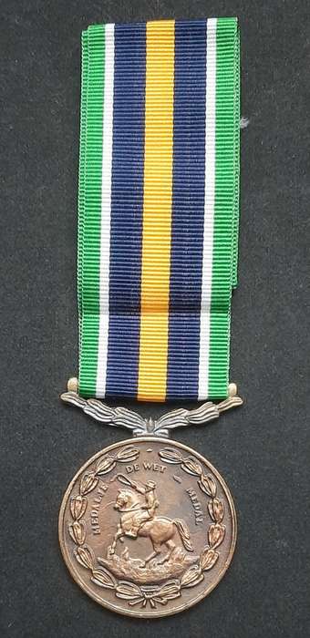 **Border War : 1980s SADF De Wet Medal w/ Ribbon  (Numbered).**