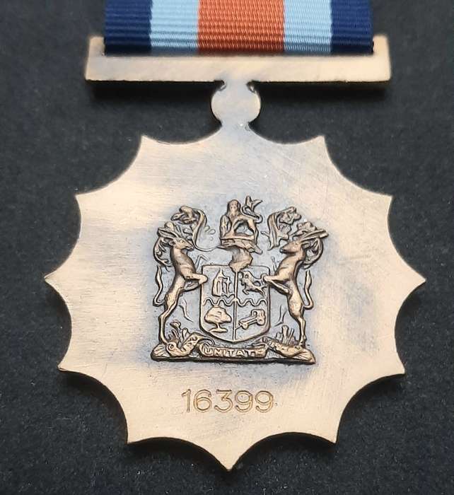 **Border War : 1980s SADF Military Merit Medal w/ Ribbon(Numbered).**