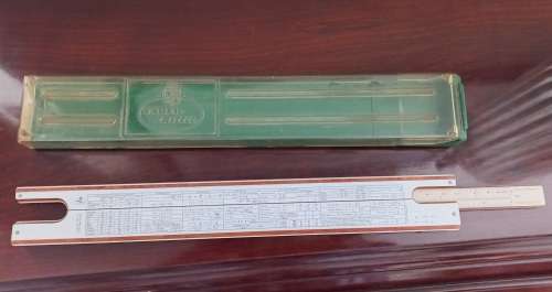 OLD PROTRACTOR AND BOTTLE