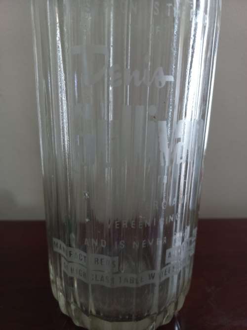 OLD PROTRACTOR AND BOTTLE