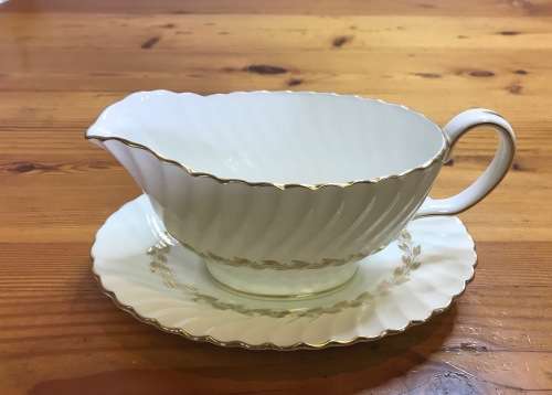 MINTON GRAVY BOAT and SAUCER GOLD CHEVIOT PATTERN RARE Very good condition.