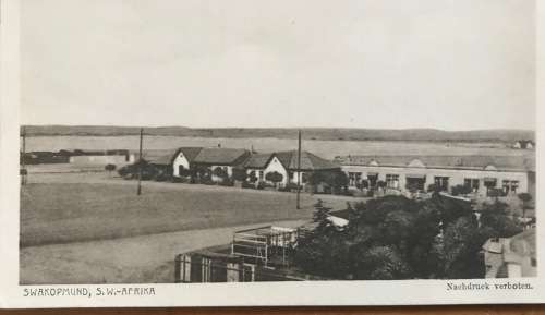POSTCARD SOUTH WEST AFRICA SWAKOPMUND PUBLISHER KURT TREDE REAL PHOTO COAT of ARMS S.W. AFRIKA SWA.