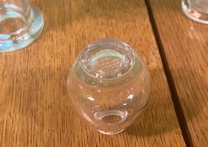 GLASS VASES / BOTTLES x 4 - possibly perfume bottles without stoppers.