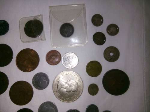 COINS - 52 ASSORTED INTERNATIONAL COINS - ALL GRADES