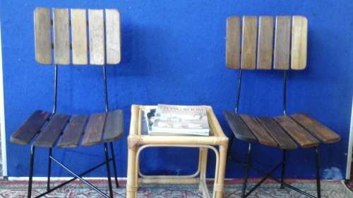 TWO FANTASTIC VINTAGE STEEL AND WOOD CHAIRS. AWESOME AND FUNCTIONAL PIECE!