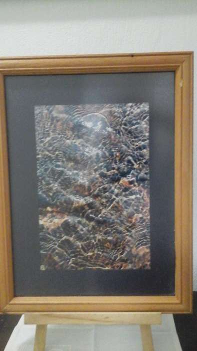 A PHOTOGRAPH NAMED RIPPLES BY M VAN STAATEN. BUY IT JUST FOR THE FANTASTIC WOODEN FRAME.