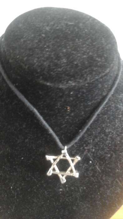 4 GORGEOUS STAR SHAPED NECKLACES. MADE FROM VINTAGE HORSESHOE NAILS. BEAUTIFUL & UNUSUAL PIECE!